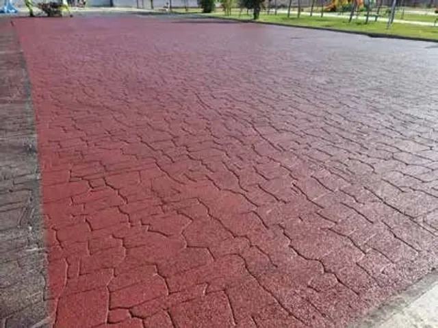 Asfalto stampato rosso con finitura effetto mattone